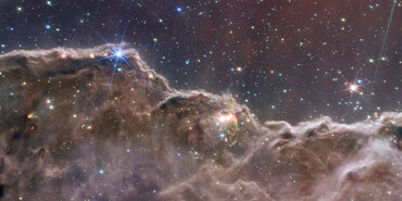 Composite image of Cosmic Cliffs observed by JWST using MIRI and NIRCam.